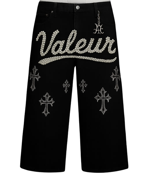 Valeur “Pearl Script” Denim Pants with pearl embroidery and gothic cross embellishments – Fall ’25 Capsule.